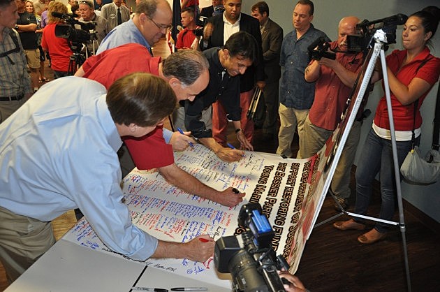 photo of banner signing