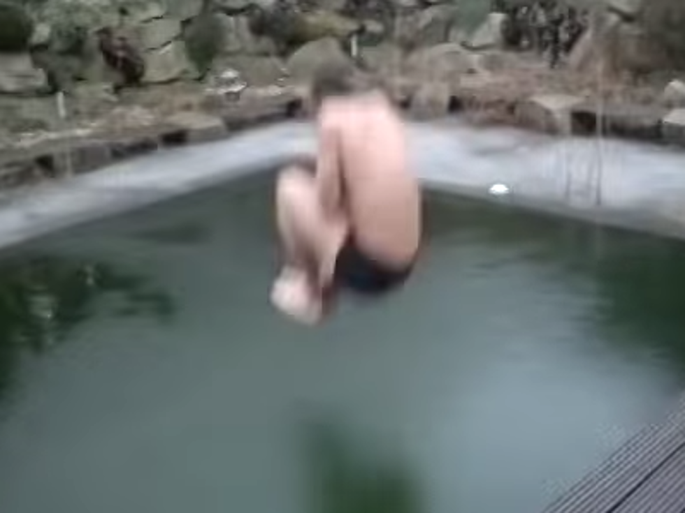 Man Tries To Cannonball Into A Frozen Pool (Video)