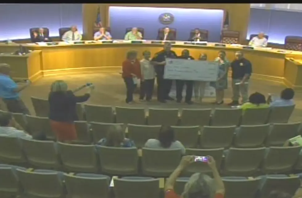 Women’s Commission Presents Checks to Police, Fire Departments