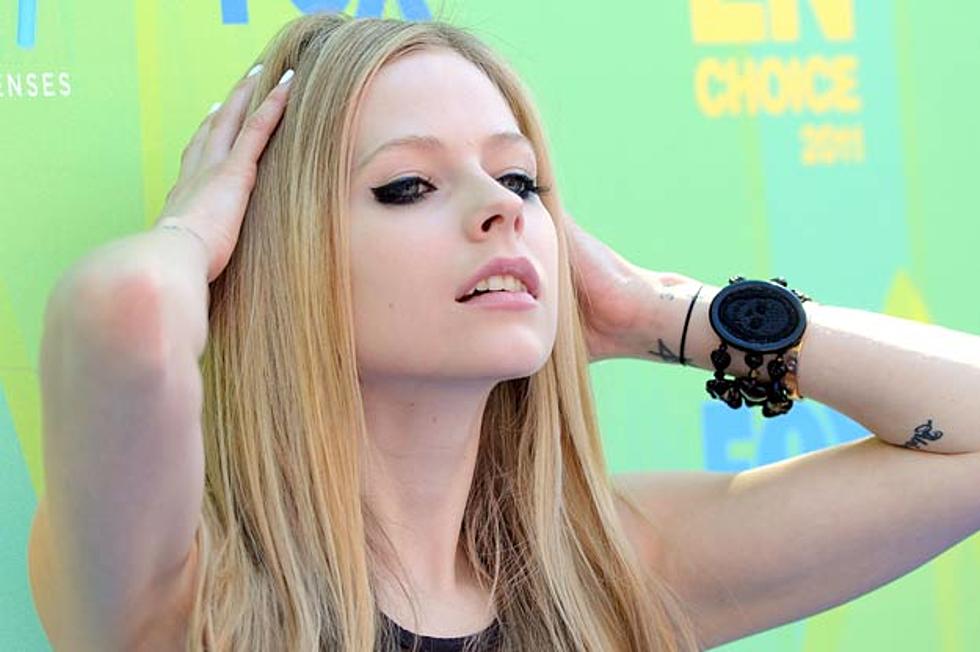 Avril Lavigne Has Black Bangs