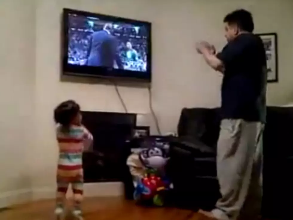 Little Girl Imitates Dad Yelling At the Game On TV (Video)