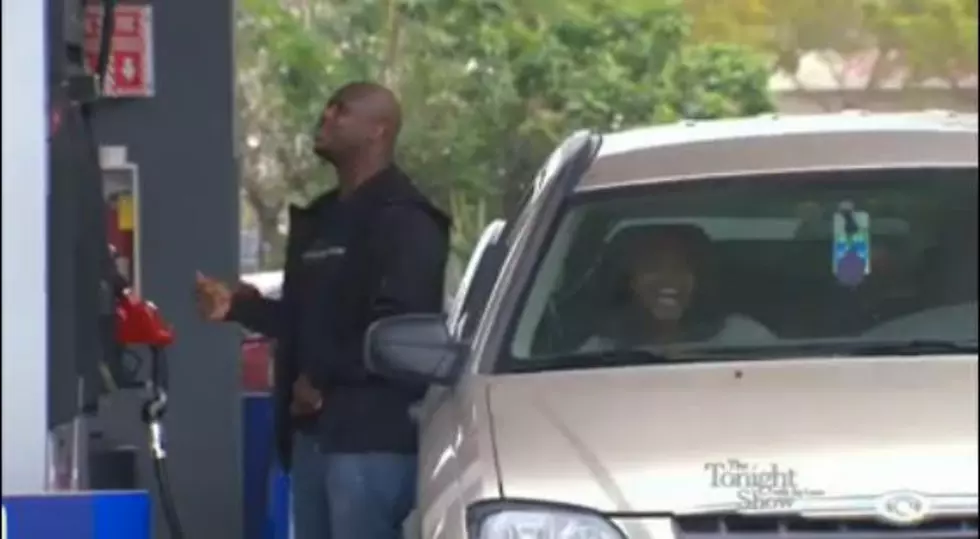 The Singing Couple at a Gas Pump