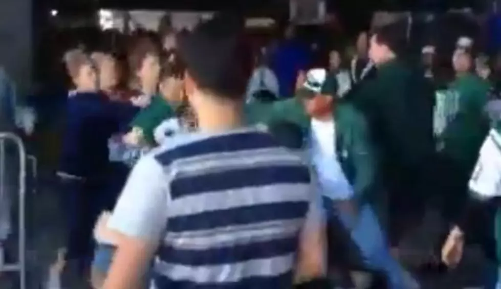 Jets Fan Punches Woman in the Face!