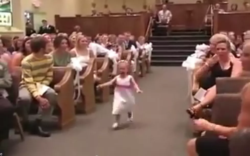 Most Unforgettable Flower Girl Entrance Ever! [Video]
