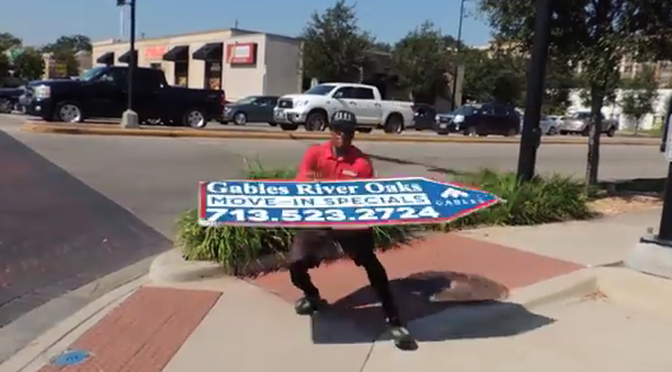 The Most Talented Sign Spinner Ever [Video]