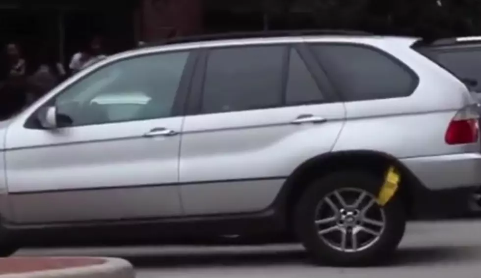 Woman Drives Off With A Boot On Her Car [Video]