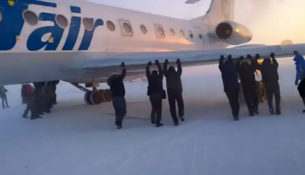 Watch What Happens When A Plane Gets Frozen To A Runway And It’s Passengers Have To Get Out And Push It [Video]