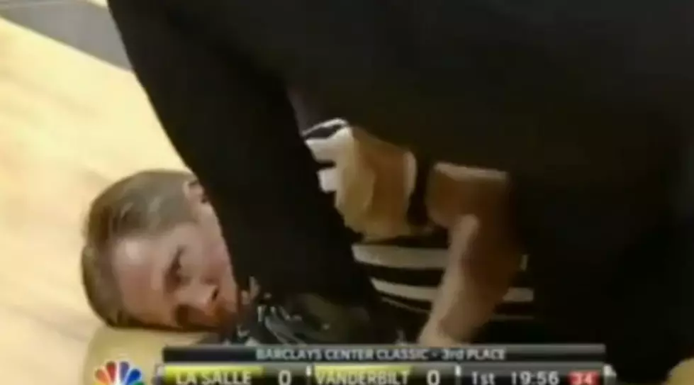 Basketball Referee Gets Knocked Out At Tip-Off [Video]