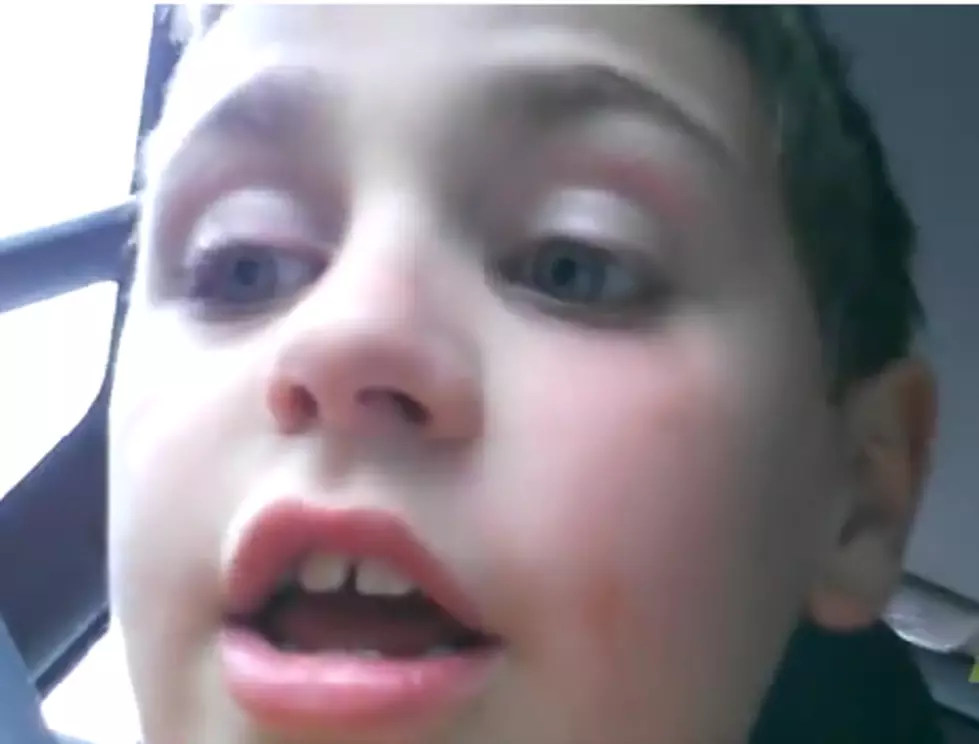 Young Boy Describes His Amazing First Kiss [Video]
