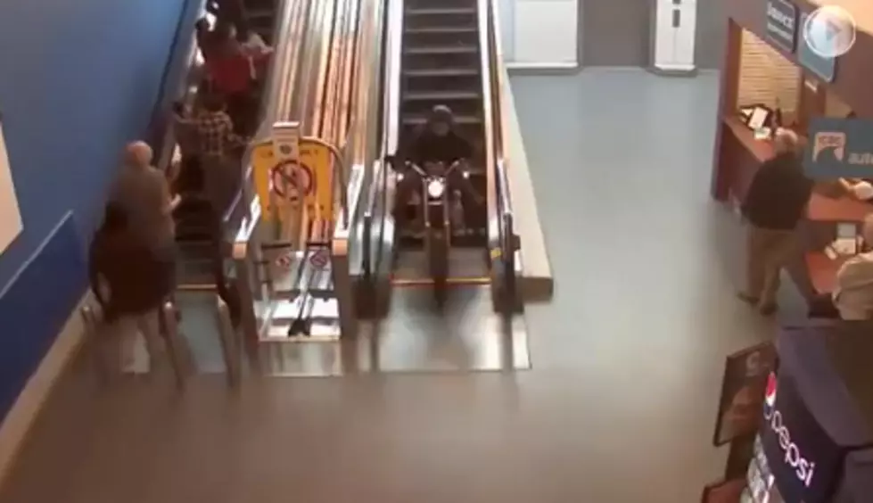 Crazy Guy On Motorcycle Rides Down Escalator In Shopping Mall While Eluding Police [VIDEO]