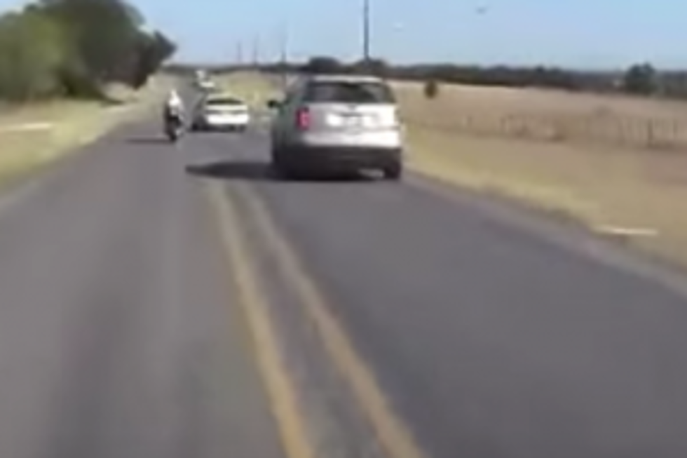 Motorist Swerves To Hit Motorcyclist  