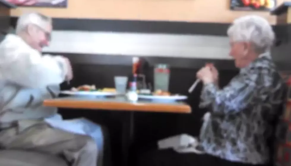 Senior Couple Enjoys Goofing Off At A Restaurant [VIDEO]