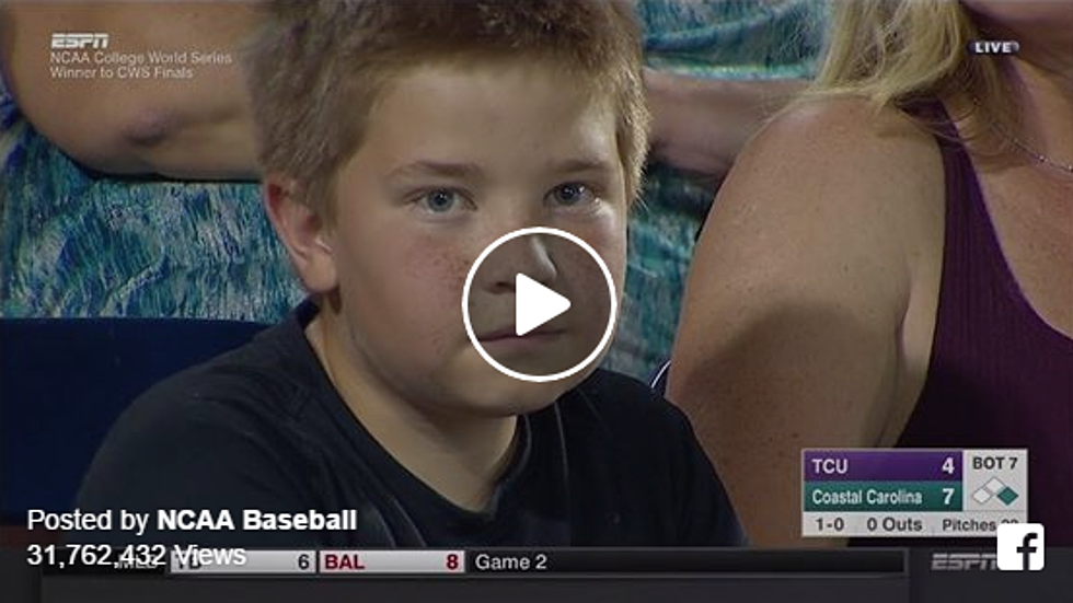 Boy Has Serious Stare Down With A Camera At College World Series [VIDEO]