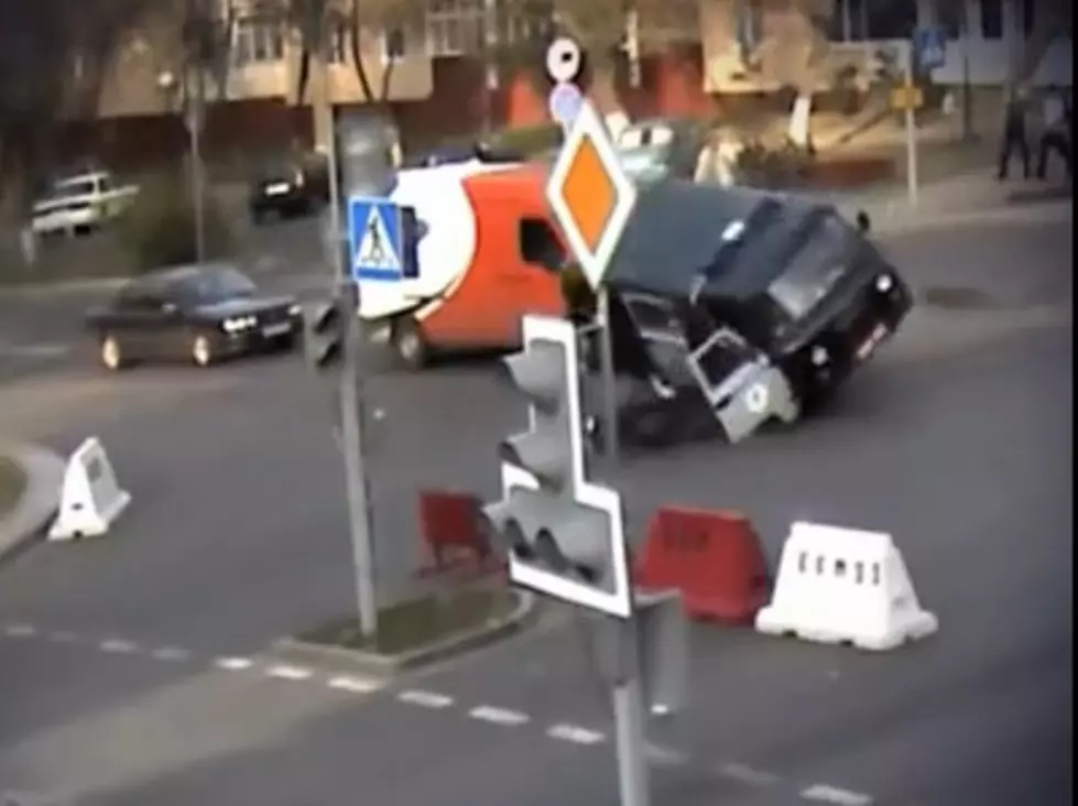 Russian(?) Car Accident &#8211; Guy Thrown Out Of Van And Walks Away [Video]