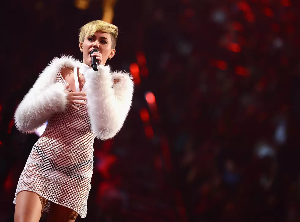 Miley Cyrus Breaks Down On Stage During iHeartRadio Performance
