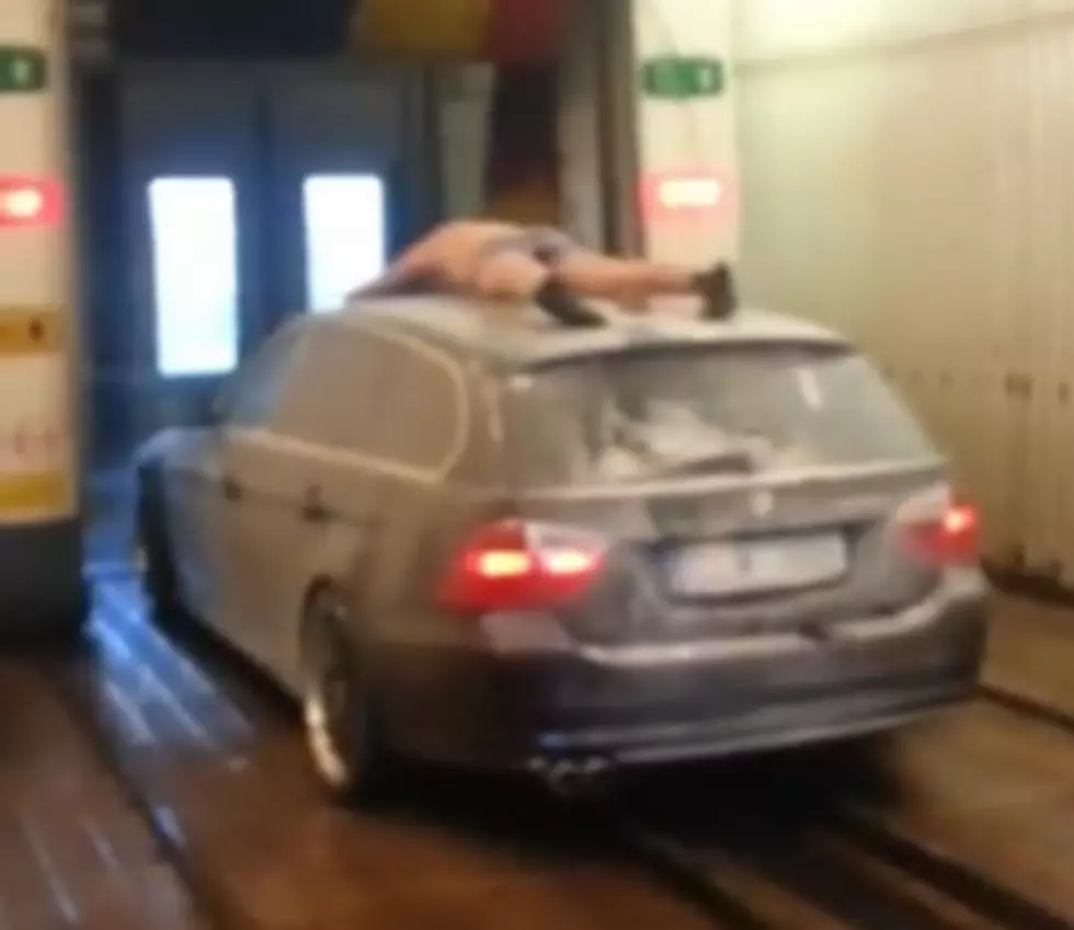 Guy Goes Through a Car Wash on the Roof