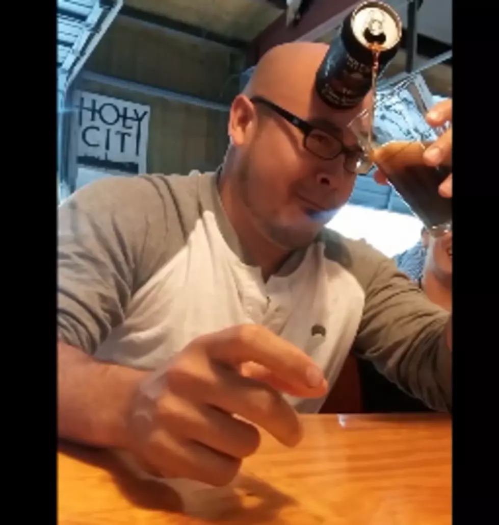 Guy Pours Beer With His Head [VIDEO]