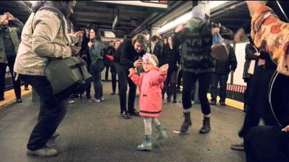 Kid Starts Dance Party to Guys Playing Music in Subway