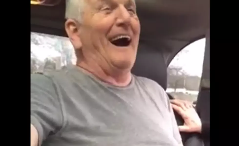 Man Gets Stuck In His Seat Belt, All He Can Do Is Laugh [VIDEO]