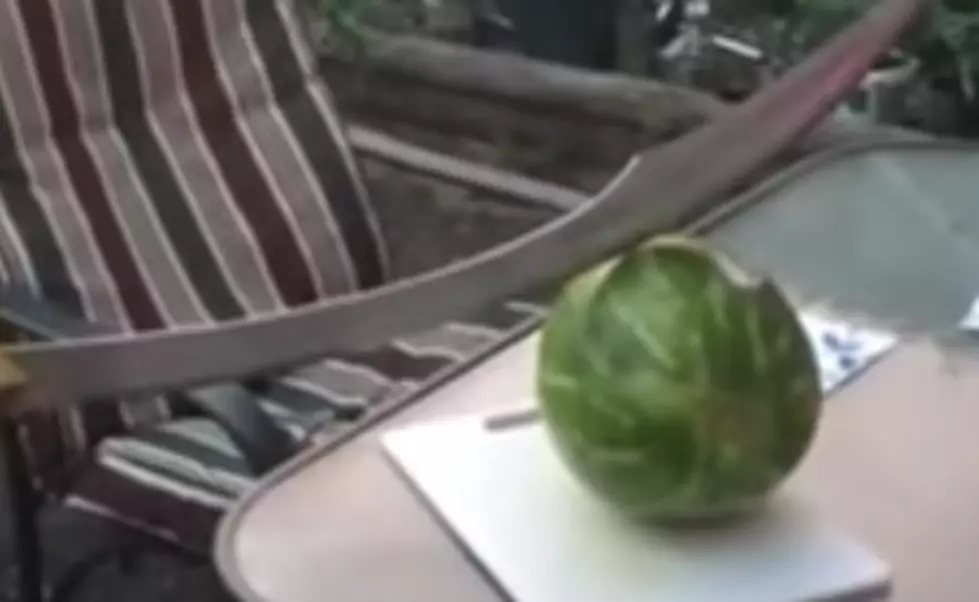 Idiot Cuts a Watermelon Sitting on a Glass Table With a Huge Samurai Sword [VIDEO]