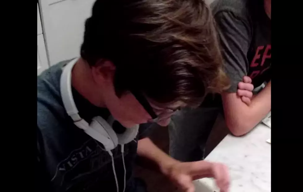 Teens Struggle to Place Cassette In Walkman [VIDEO]
