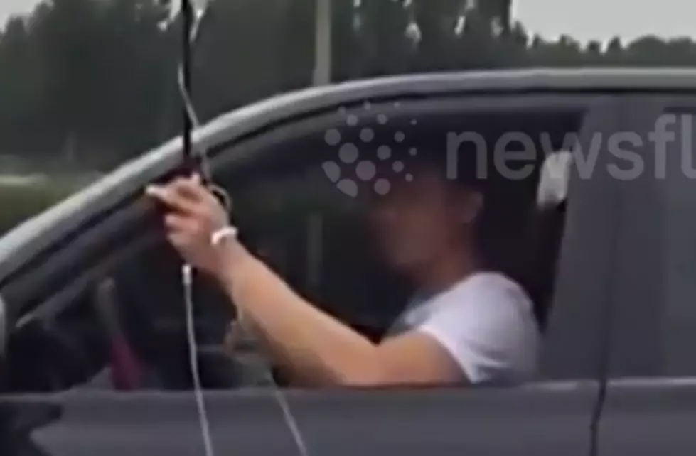 Bizarre Video, Man Filmed Drinking And driving While Attached To An I.V. [VIDEO]