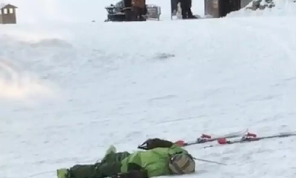 Drunk Guy Attempts To Put On Skis, Fails Miserably [VIDEO]