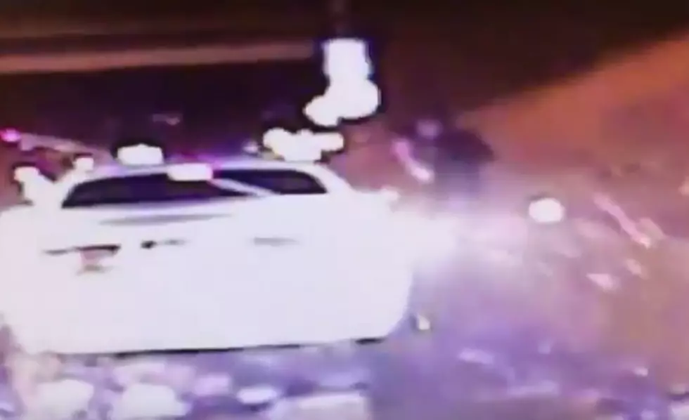 Beer Truck Crashes Next To Cop, Drenches Officer In Beer [VIDEO]