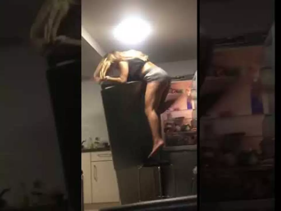 Drunk Chick Falls Hard Off Refrigerator [VIDEO]
