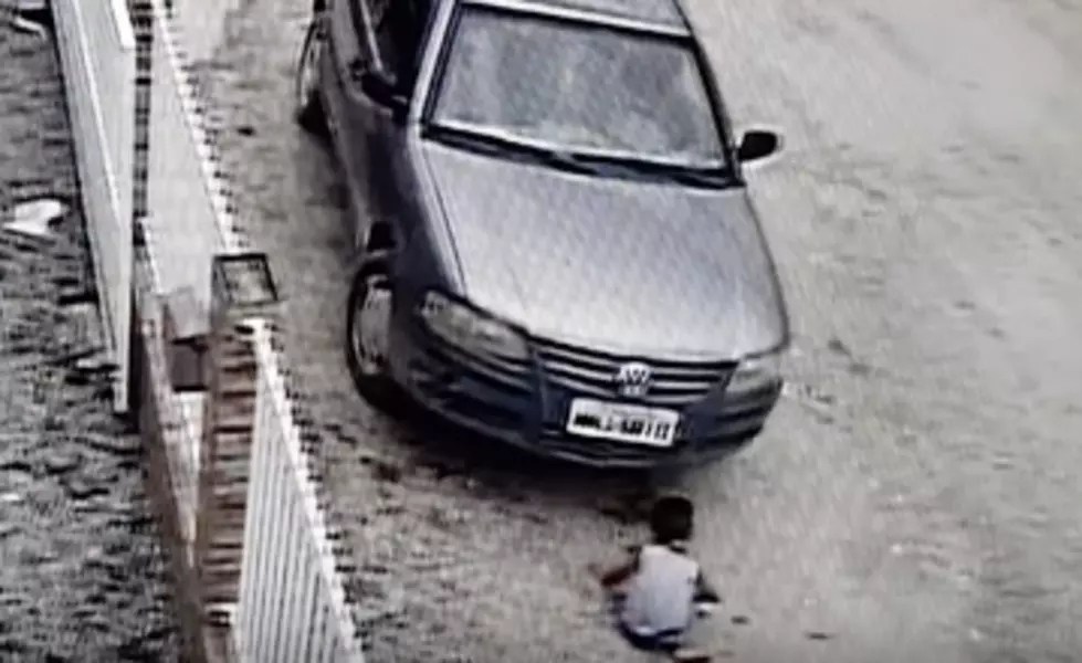 Boy Ran Over By Car, Immediately Pops Up Uninjured [VIDEO]