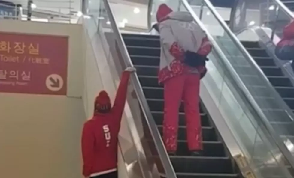 Olympic Skier Pulls Off Epic Escalator Stunt [VIDEO]