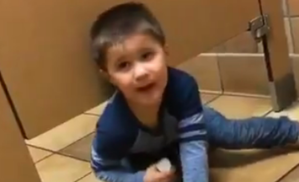 Kid Crawls Under Bathroom Stall to Seek Help From Stranger [VIDEO]