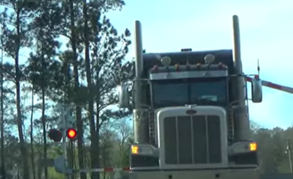 Truck Stuck on Train Tracks Gets Demolished By Oncoming Train [VIDEO]