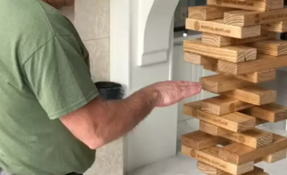 Watch This Dad Pull Off The Sweetest Jenga Move Ever [VIDEO]