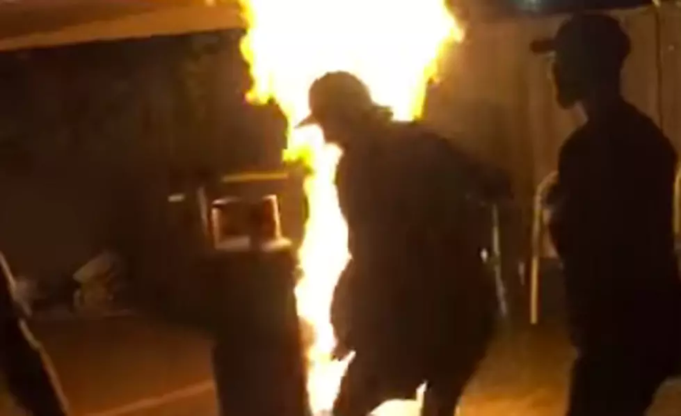 Two Dudes Collide While Jumping Over Bonfire [VIDEO]