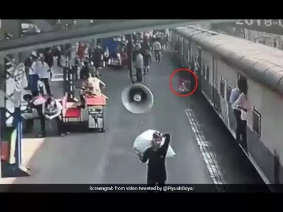 Police Officer Saves Little Girl From Moving Train [VIDEO]