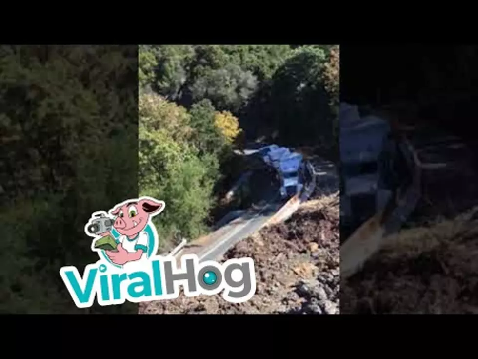Watch as a Big Rig Slips and Falls off a Mountain Road [VIDEO]