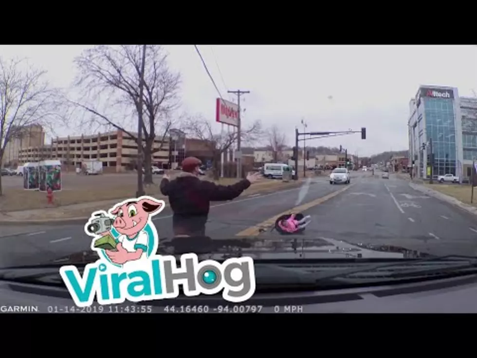 Child in Car Seat Falls Out of Moving Car Onto the Road [VIDEO]