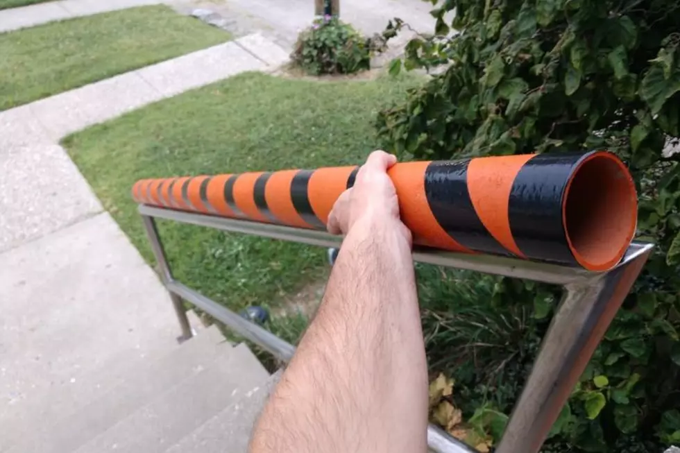 Man is Saving Halloween with a Candy Chute