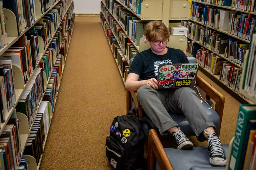 A College Student Studies in a University Library