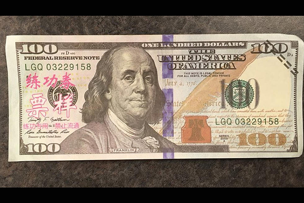Counterfeiter Tries to Pass $100 Bills with Chinese Writing