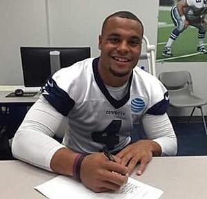 Prescott Officially Signs With Dallas Cowboys