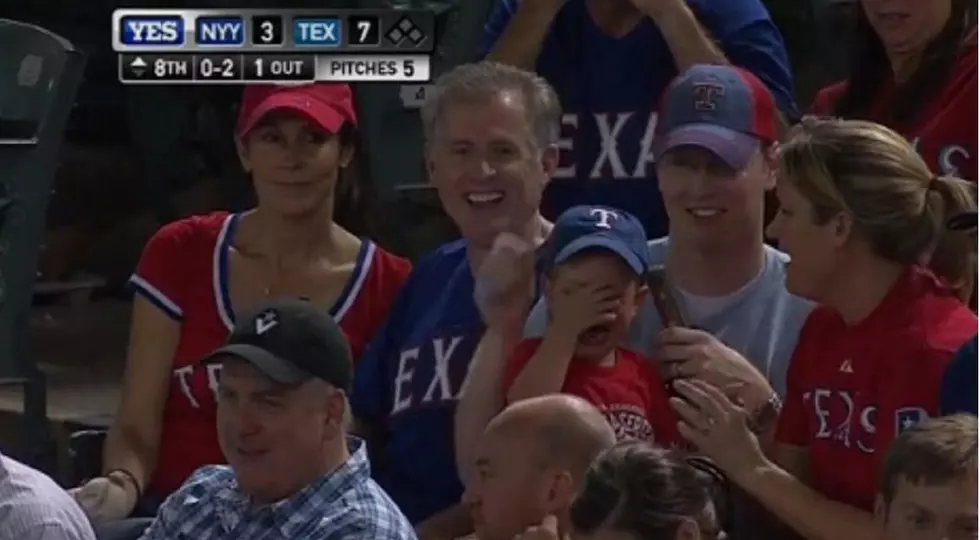 Texas Rangers Couple with Foul Ball ‘Unaware’ of Crying Kid [UPDATE/VIDEO]