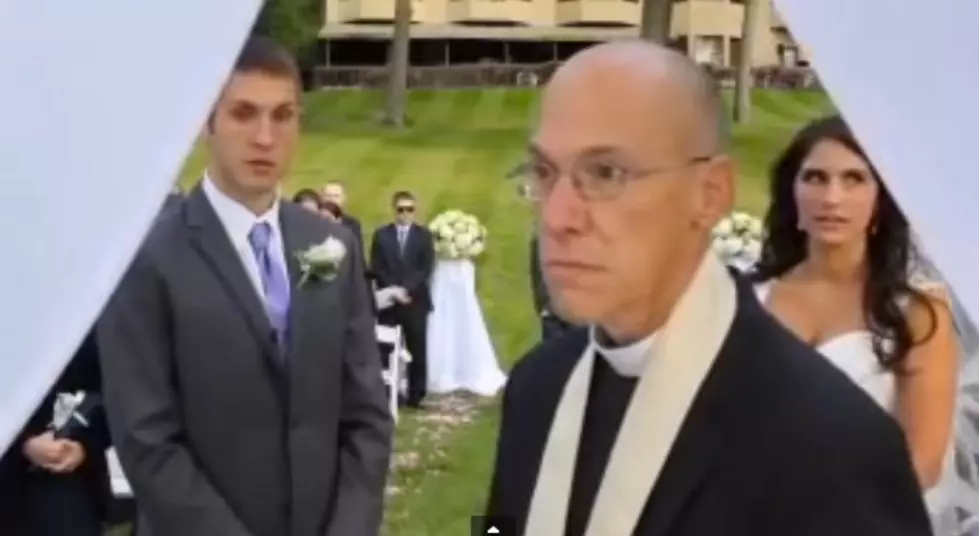Priest Stops Wedding Ceremony to Chastise Videographer [VIDEO]