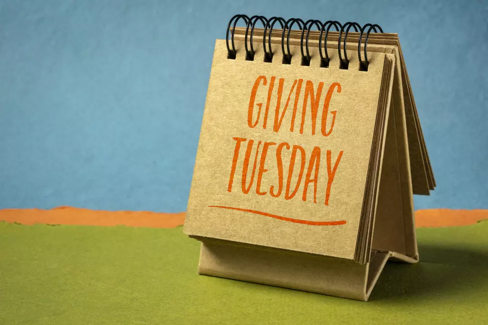 Giving Tuesday handwriting in an art sketchbook