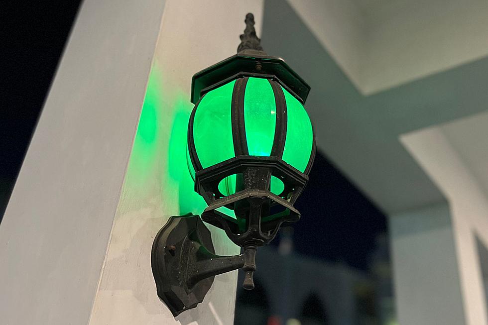 What's The Meaning Behind Green Porch Lights In Texas?