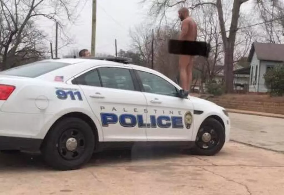 Palestine Police Arrest Naked Man While Standing On Police Car