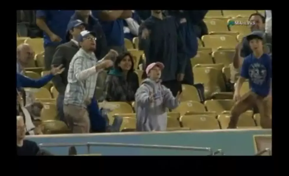 Dad of the Year Drops Daughter to Catch Foul Ball [VIDEO]