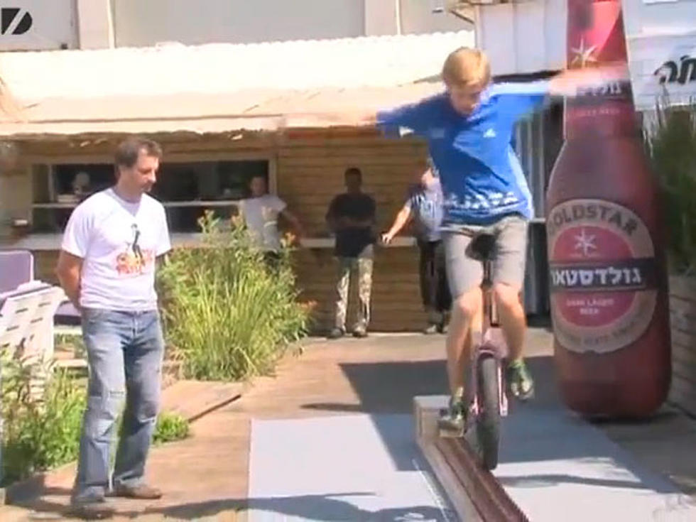 Man Breaks Record for Unicyling On Top of Beer Bottles [VIDEO]