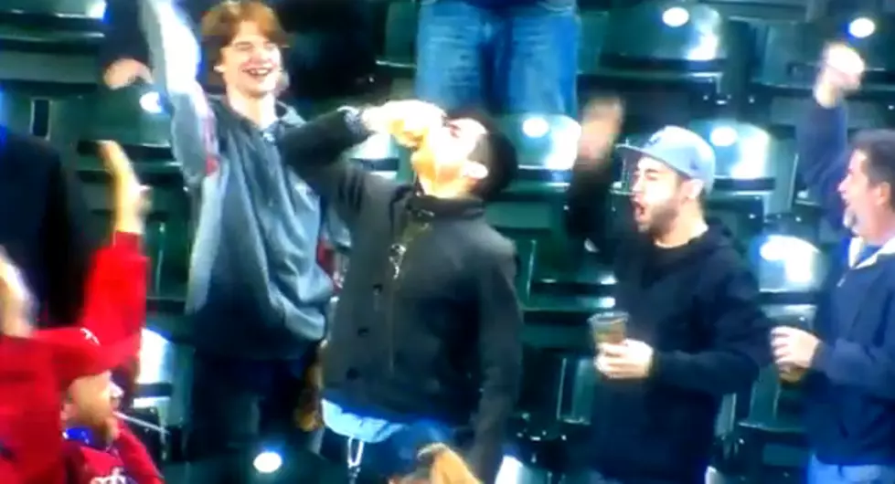 Baseball Fan Catches Foul Ball in Beer [VIDEO]